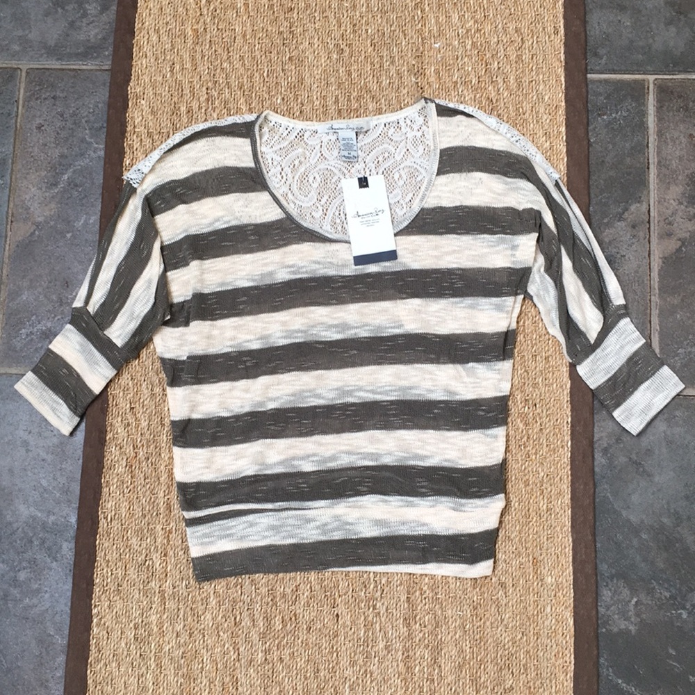 Striped sweater top.